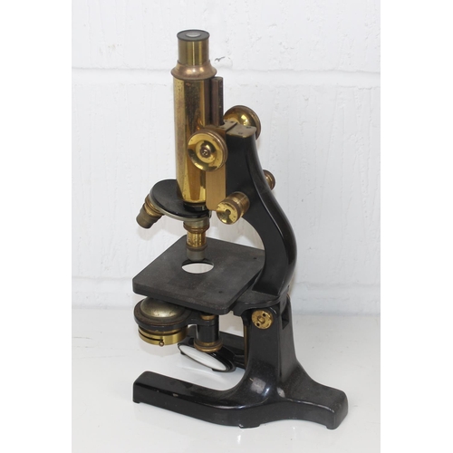 758 - A Hearson of London brass monocular microscope in wooden case