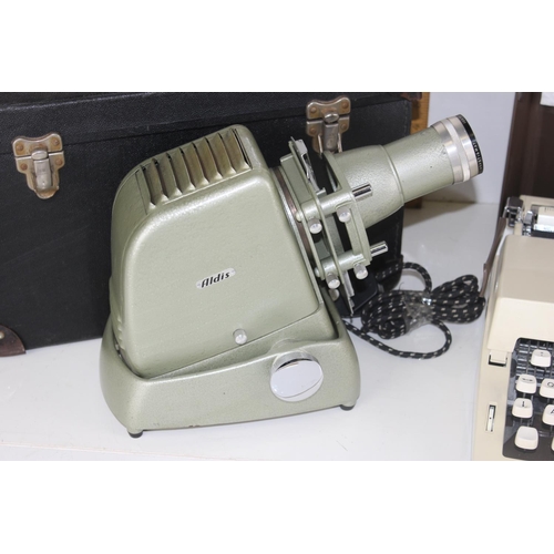 770 - Vintage Aldis projector and an Imperial 2002 typewriter