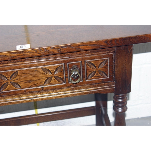 81 - A Jacobean style oak side table with drawer