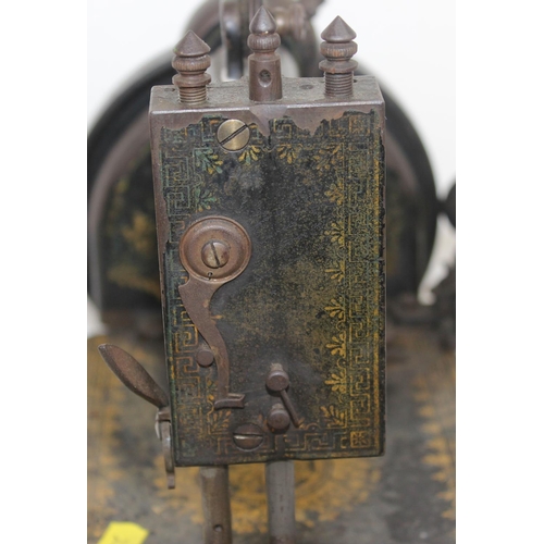 848 - An unusual late 19th century cast iron sewing machine - Boston Star