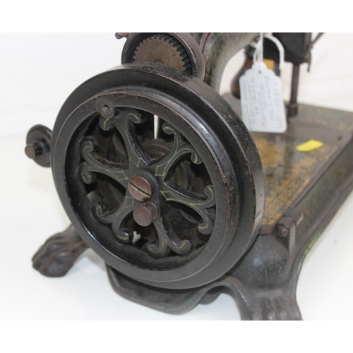 848 - An unusual late 19th century cast iron sewing machine - Boston Star