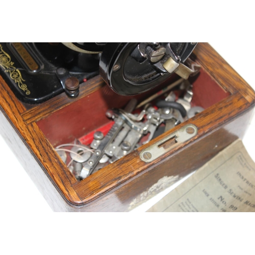 875 - Singer sewing machine in case