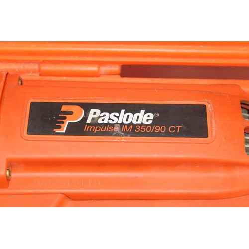 894 - A Paslode Impulse IM 350/90 CT nail gun with accessories