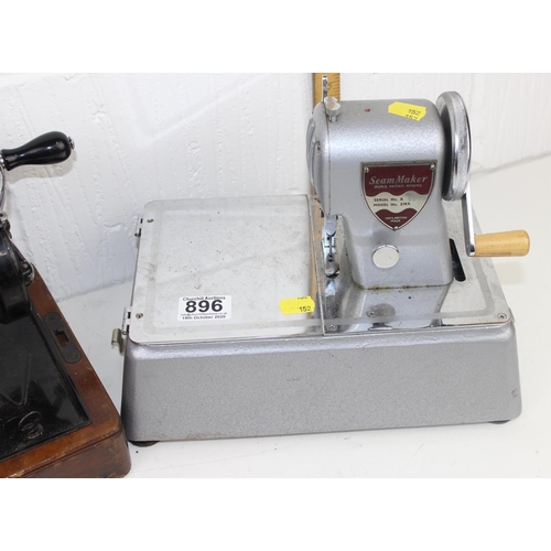 896 - 2 sewing machines - Singer and a rare Seam Maker with paperwork etc