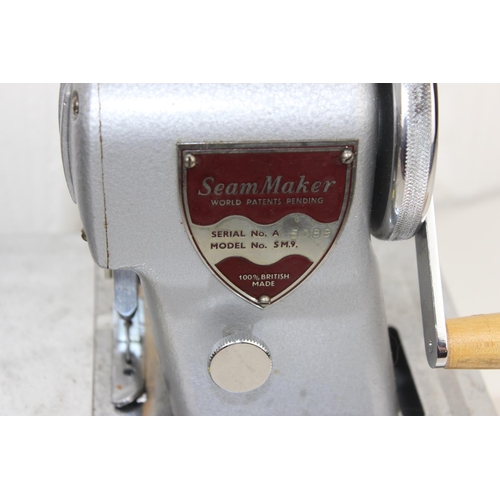 896 - 2 sewing machines - Singer and a rare Seam Maker with paperwork etc