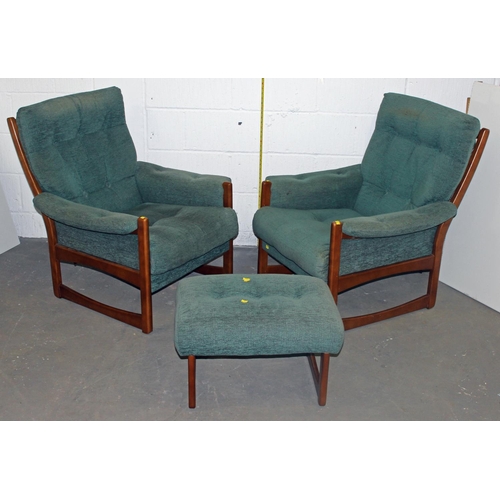 96 - A retro green upholstered show frame sofa, 2 chairs and a foot stool in the manner of Ercol