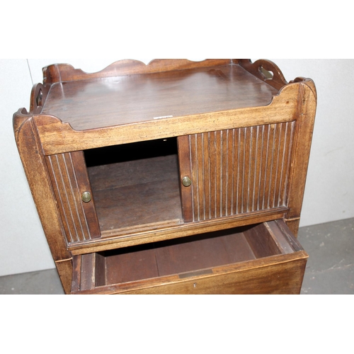 185 - A George III period mahogany tray top bedside cabinet or night stand with tambour front