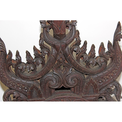 1457 - A highly impressive early 20th century carved hardwood mantle clock in the Anglo-Indian style. Profu... 