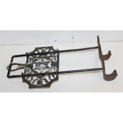 2006 - Antique brass and steel sliding trivet