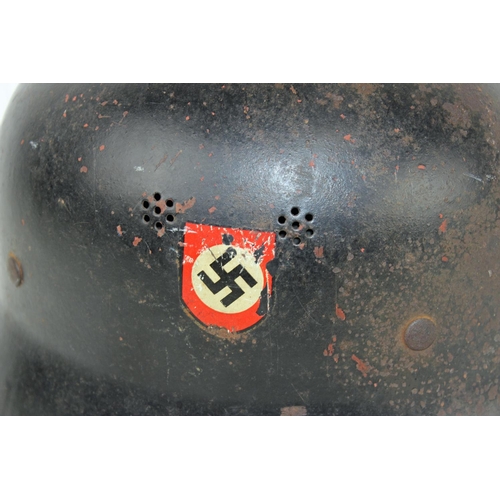 1043 - A WW2 period German police helmet with 2 decals and leather liner