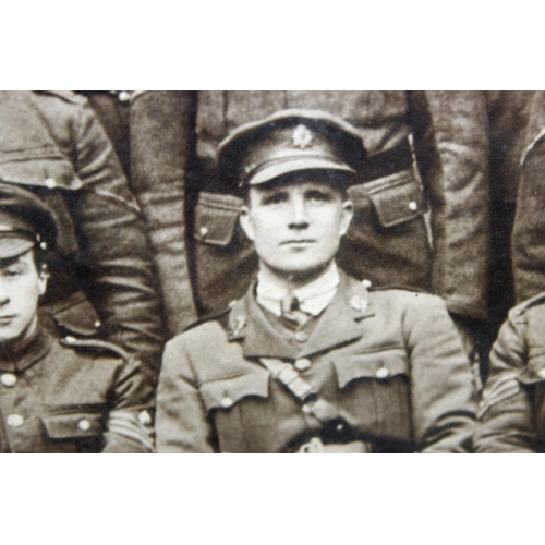 1049 - A large WW1 period photograph of a military group in Oak frame, regiment unknown