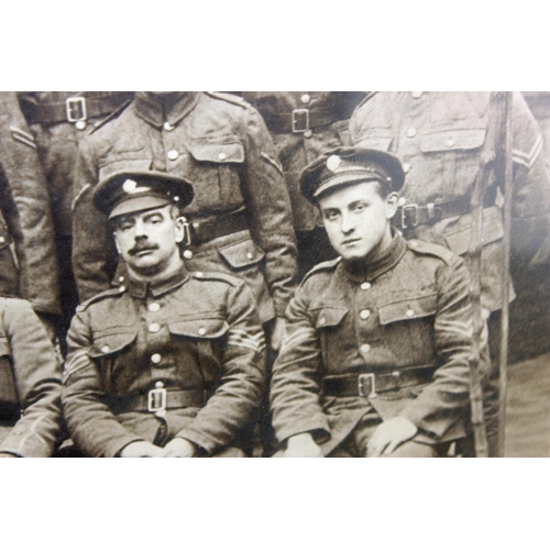 1049 - A large WW1 period photograph of a military group in Oak frame, regiment unknown