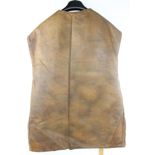 1067 - A 1941 dated WW2 period Camouflage Leather Jerkin by Hector Powe with a large qty of fabric patches ... 