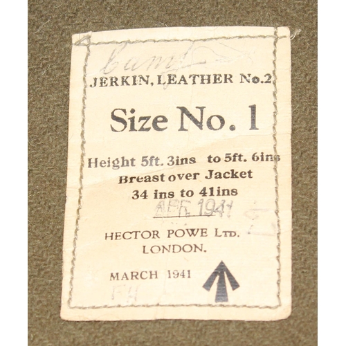 1067 - A 1941 dated WW2 period Camouflage Leather Jerkin by Hector Powe with a large qty of fabric patches ... 