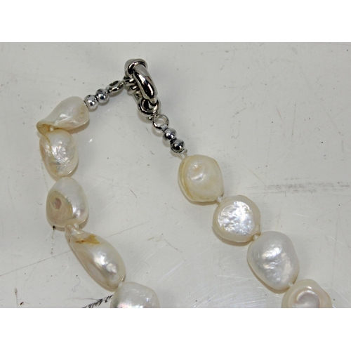 1279 - South Sea baroque shell white pearl necklace in box.