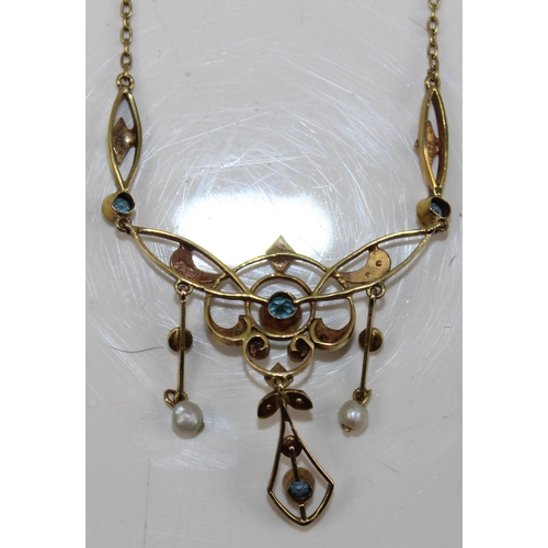 1280 - An Edwardian 9ct gold Art Nouveau pendant set with seed pearls and Aquamarines