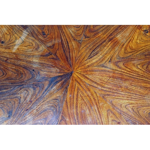 154 - A 19th century Rosewood veneer tilt top table with unusual star design standing on tripod base