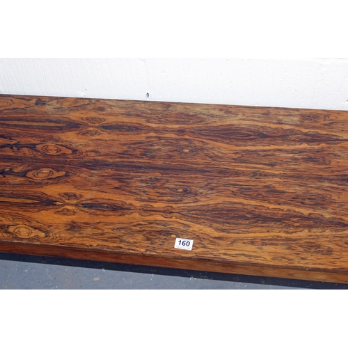 160 - In the manner of Johannes Andersen - a long figured Rosewood veneer retro coffee table likely of Dan... 