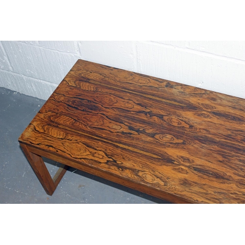 160 - In the manner of Johannes Andersen - a long figured Rosewood veneer retro coffee table likely of Dan... 