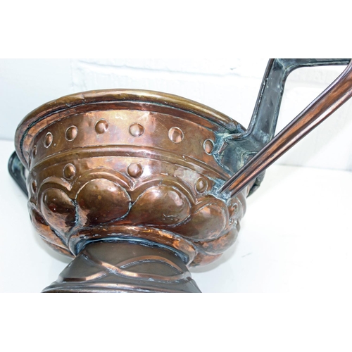 1701 - A large Arts & Crafts period copper bowl with handles in the manner of Newlyn