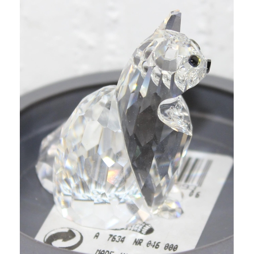 1710 - 8 boxed Swarovski animals and items to inc a train and carriages, Pig, Penguin, Goose, Cat etc