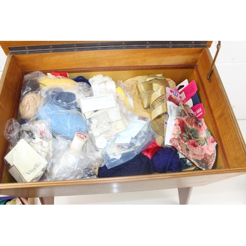 392 - A retro sewing box and contents