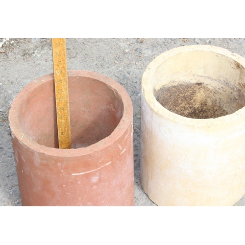 577 - 2 large sections of terracotta pipe for planters