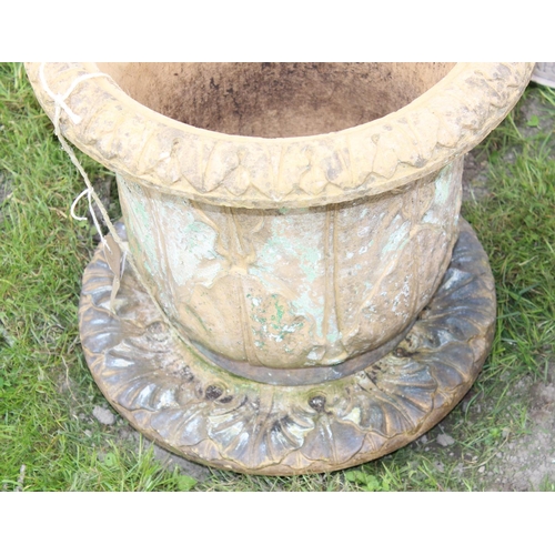 582 - A Victorian pottery planter formed as an urn with matching stand