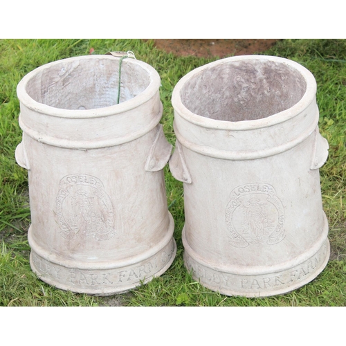 586 - A pair of pottery planters with armorial crest by Loseley Park Farm