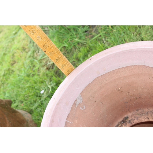 587 - A large pair of glazed pottery planters - approx 14