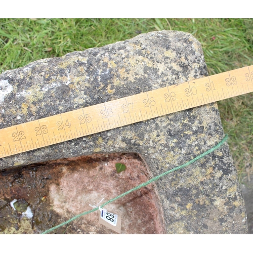 588 - A very large 19th century carved stone sink with rounded end