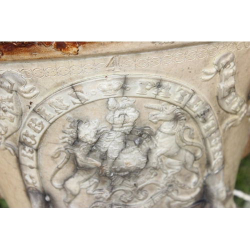 594 - Large Victorian period salt glazed stoneware water filter with raised Royal coat of arms and grapevi... 