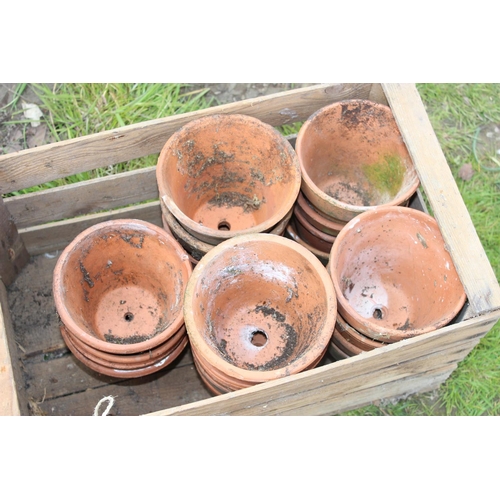 596 - Wooden crate of terracotta garden pots