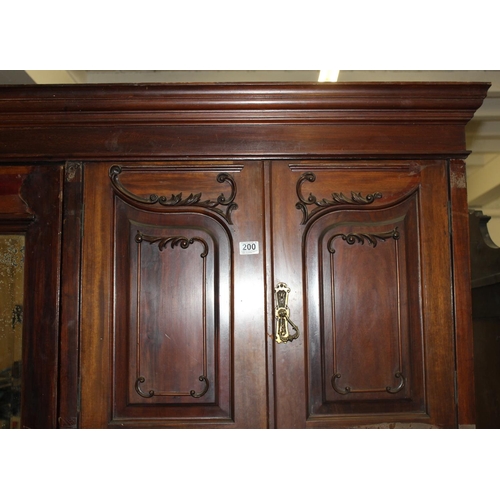 200 - A late 19th/ early 20th century darkwood Compactum wardrobe