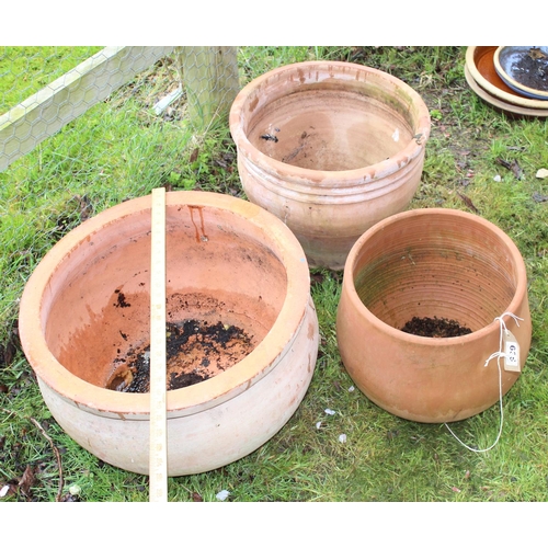 635 - 3 large round terracotta planters