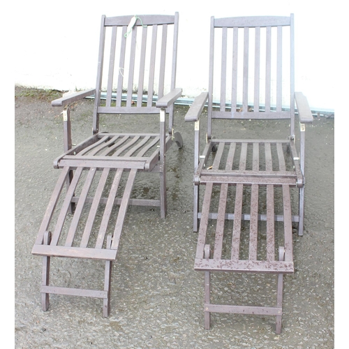 637 - A pair of hardwood sun loungers or steamer chairs with cushions