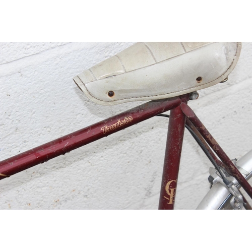 805 - A vintage Peugeot Touriste bicycle - Postage/ Packing not available