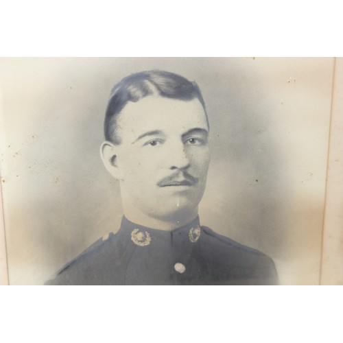 1026 - A large WW1 period framed photograph of a Royal Marines soldier