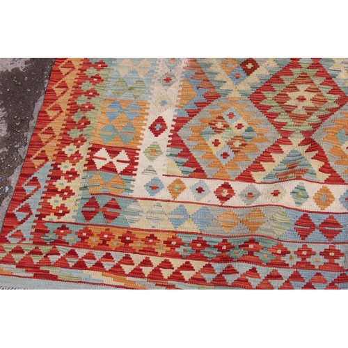 262 - A large vegetable dyed wall Choli Kilim carpet, approx 306cm x 200cm