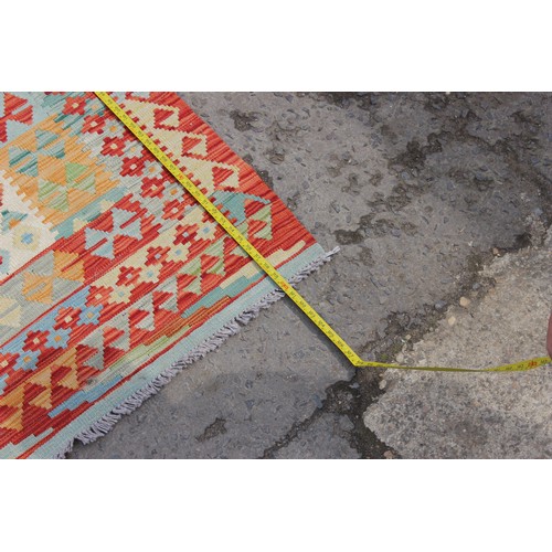 262 - A large vegetable dyed wall Choli Kilim carpet, approx 306cm x 200cm