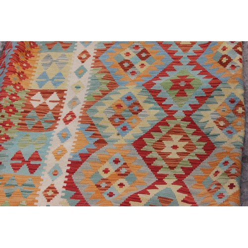 262 - A large vegetable dyed wall Choli Kilim carpet, approx 306cm x 200cm