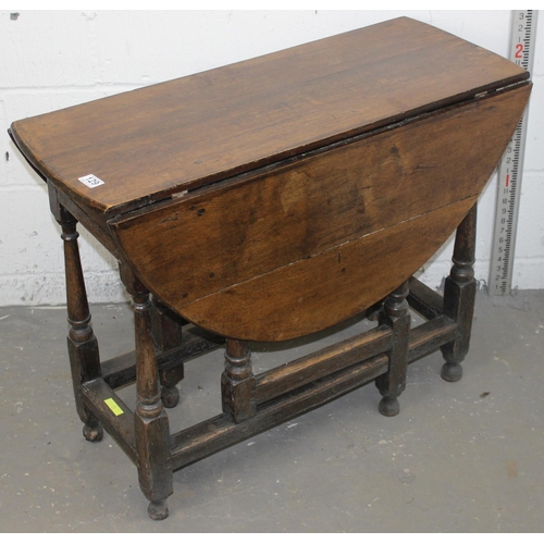 129 - 18th Century Oak drop-leaf table with drawer