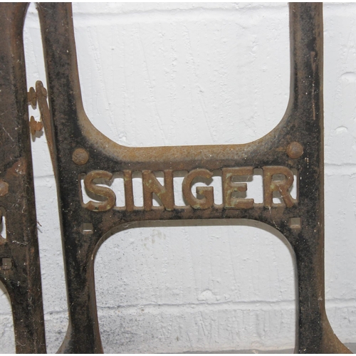 134 - A Vintage cast-iron Singer sewing machine base with marble top