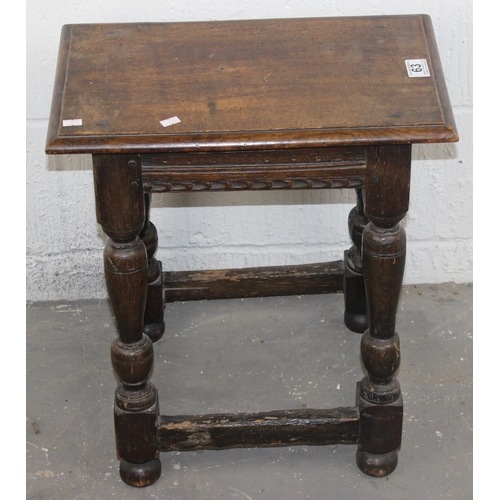 63 - 17th century & later oak coffin or joint stool with carved frieze