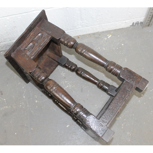 64 - 17th century oak coffin or joint stool with carved frieze