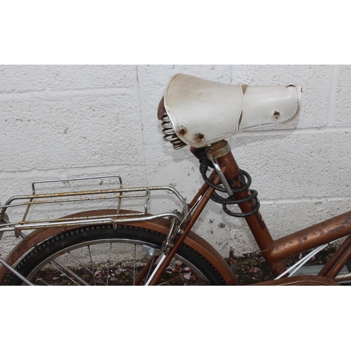 681 - A vintage Raleigh Shopper bicycle with bell