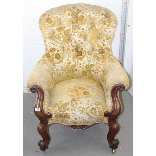 71 - Victorian button backed armchair standing on impressive carved wooden legs