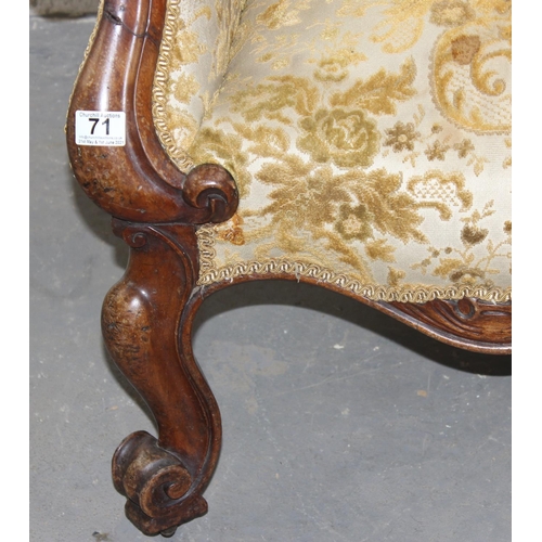 71 - Victorian button backed armchair standing on impressive carved wooden legs