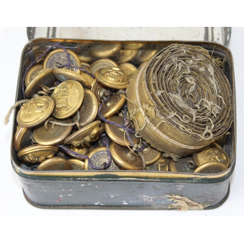 1011 - Vintage tin containing mainly Royal Naval buttons and a roll of gold coloured Brading