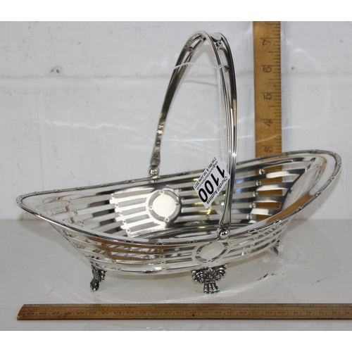 1100 - Silver pierced swing-handled basket. Hallmarked Sheffield 1908 by James Dixon & Sons. Approx 432g.